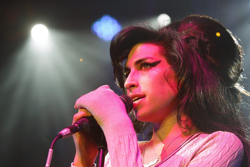 British singer Amy Winehouse, above, performed during her concert at the Volkshaus in Zurich, Switzerland. Winehouse was found dead Saturday by ambulance crews who were called to her home in north London's Camden area.