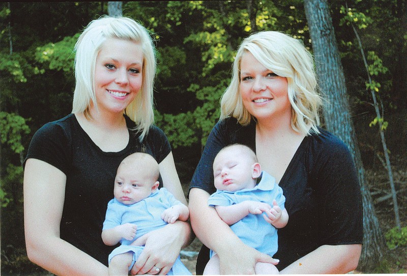 Jennifer Lubbers, left, holds her son, Cooper Vollrath, next to her older sister, Kellie Smith, and her new baby, Brock Smith. The sisters delivered their boys on the same day