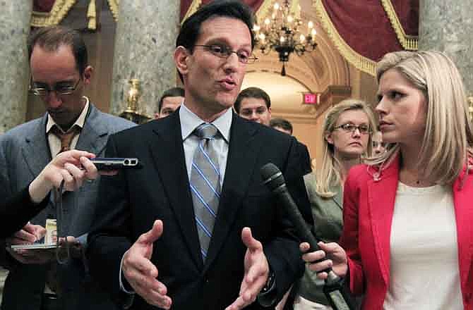 House Majority Leader Eric Cantor, R-Va., leaves the House chamber after the House of Representatives passed the emergency legislation to avoid a government default a day before the deadline on Capitol Hill in Washington, Monday, Aug. 1, 2011. 