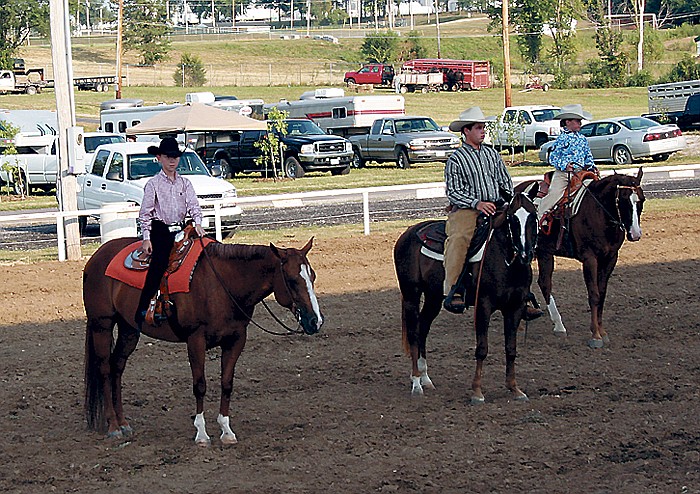 Justin Eddy, at left, is judged with seven other entrants (not all shown) in the 13 and under 'Walk Trot Pleasure' class at the Sho-Me Circuuit Horse Show Saturday. Eddy won first place.