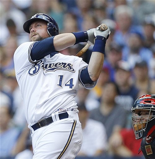 Casey McGehee of the Brewers watches his two-run home run in the third inning Wednesday's game against the Cardinals. McGehee hit three home runs in Milwaukee's 10-5 win. 