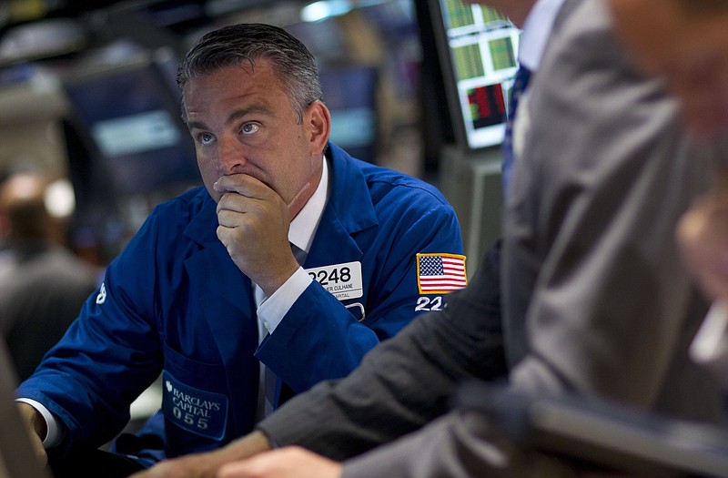 Traders work Thursday on the floor of the New York Stock Exchange. Gripped by fear of another recession, the financial markets suffered their worst day Thursday since the crisis of 2008. 