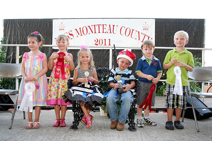 Little Mr. and Miss Moniteau County were crowned Tuesday, Aug. 2, at the main arena of the Moniteau County Fairgrounds. The 2011 Little Miss and Mr. Moniteau County, center, are Kierstyn Lawson, 5, and Walker Cary, 4. Runners-up, from left, are Kinleagh Monroe, 5, second runner-up; Myra Silvey, 5, first runner-up; Bronc Hibdon, 4, first runner-up; and Henry Hirschvogel, 5, second runner-up.
