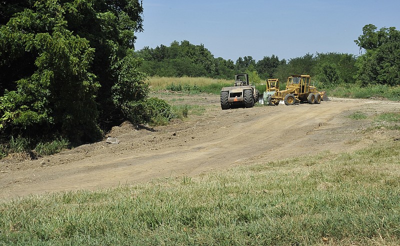 The plan to bring the Greenway to the east end of town is starting to take shape as a path has been cleared along Riverside Drive to push the greenway from Riverside Park to the Lewis and Clark Building.