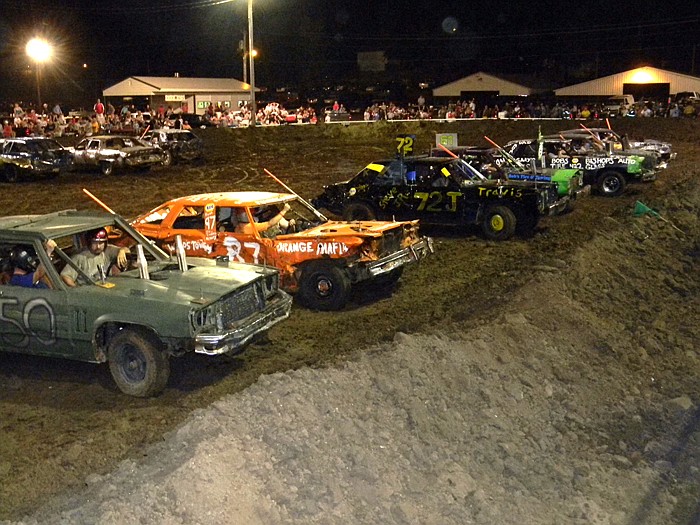 Competitors line up for the final A Feature Demolition Derby held Thursday, Aug. 4, at the Moniteau County Fair. The A Feature decided the 2011 Derby Champion.