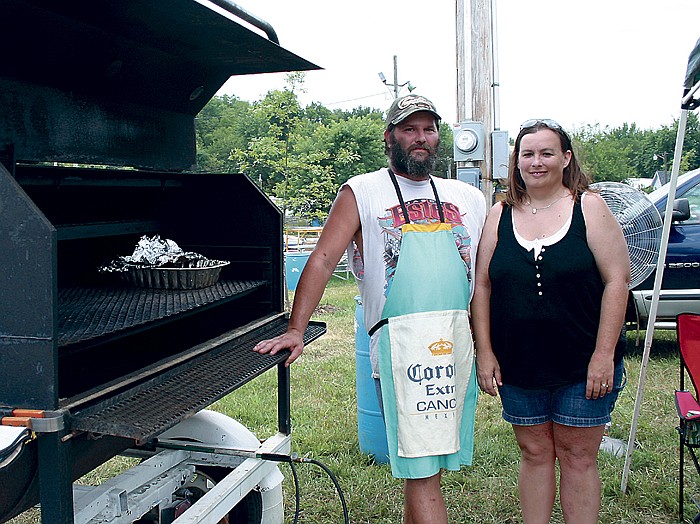 Mike Foxworthy, California, above with wife Tonya, took first place in each of the three categories (Fan Favorite, Chicken and Pork Steak) at the Backyard BBQ contest Saturday afternoon at the Moniteau County Fair and was the Grand Champion.