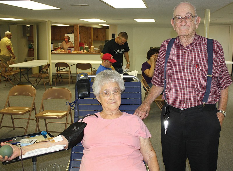 Edith and Gene Craighead, of Fulton, give blood Wednesday at an American Red Cross blood drive held at Southside Baptist Church. Together the couple has given blood 200 times.