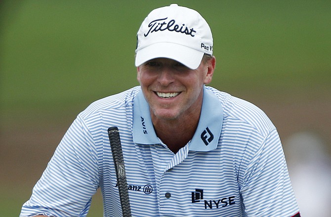 Steve Stricker smiles as he gets ready to putt on the eighth hole during Thursday's first round of the PGA Championship at the Atlanta Athletic Club in Johns Creek, Ga.