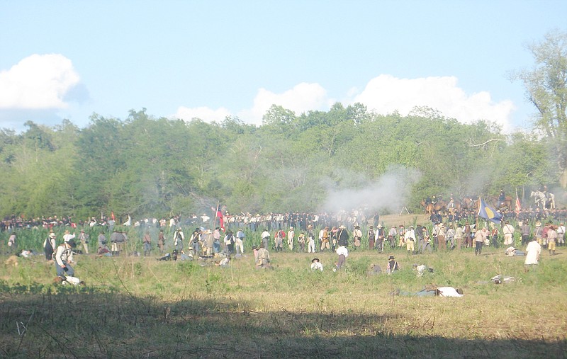 Missouri Guard soldiers face off against Union troops during a re-enactment of the Battle of Wilson's Creek Aug. 13 outside Springfield. A total of 3,500 re-enactors participated in the 150th anniversary of the battle.