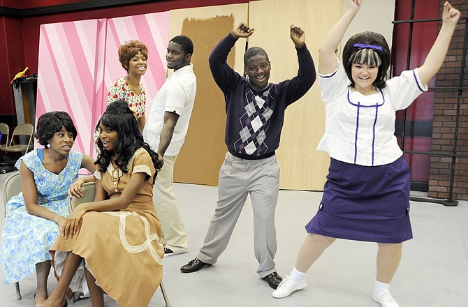 The musical "Hairspray" features '60s-era singing and dancing.