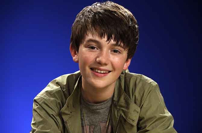 In this Aug. 2, 2011 file photo, singer Greyson Chance poses for photos, in New York. Chance, the 2010 YouTube sensation, is promoting his debut album, "Hold On "Til The Night."
