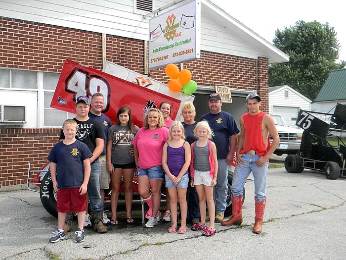 XXTreme Glass Owners Ed Forsythe and Dana Phillips, employees, family and friends at XXTreme Glass' Open House/Grand Opening held Saturday, Aug. 20.