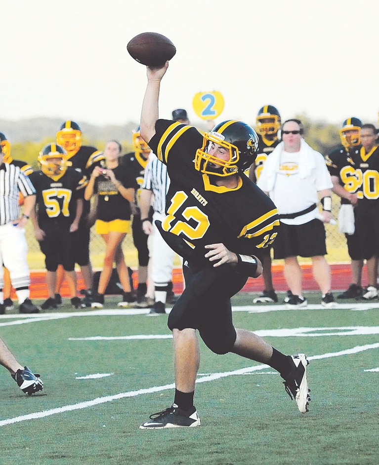 Fulton senior quarterback Jake Matthews throws a pass during Friday night's jamboree scrimmages at Blair Oaks in Wardsville.