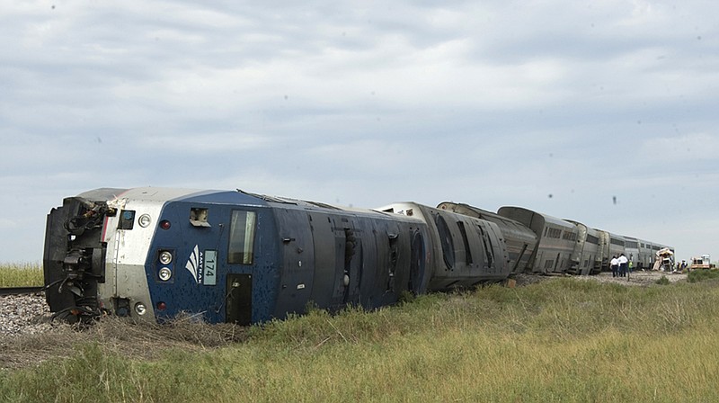 An Amtrak train carrying more than 175 passengers sits derailed Friday near Benkelman, Neb.