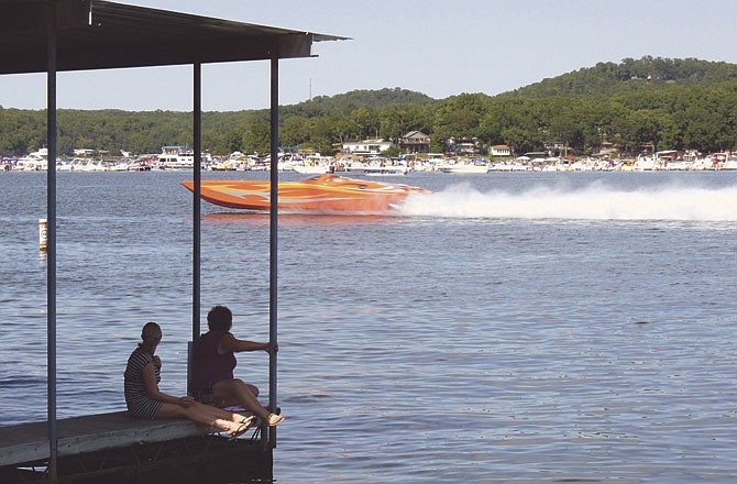 Visitors and residents of Windsor Bay Condominiums enjoyed having a race-side seat from the complex's docks during Saturday's Lake of the Ozarks speed trials in the open and professional class divisions.