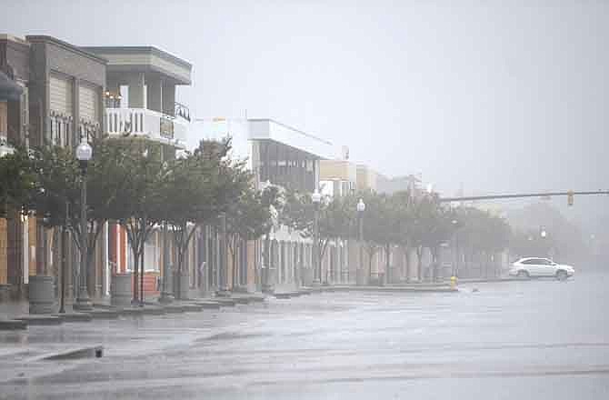 Hurricane Irene continues to soak the coast with heavy rain and high winds in Rehoboth Beach, Del., on Saturday, Aug. 27, 2011. (AP/Delaware County Daily Times, Chuck Snyder)