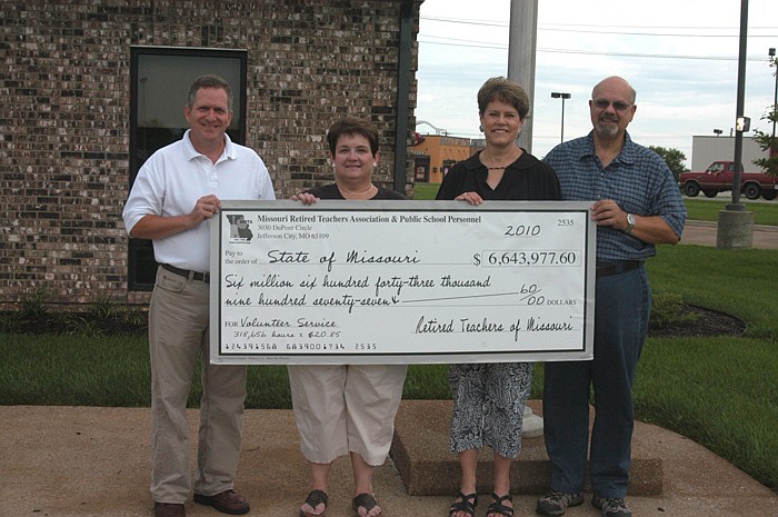 The Moniteau County Retired Teachers Association were recently recognized for playing a part in community service projects. Holding a check representing the value of volunteer service of retired teachers across Missouri - $6,643,977.60 - are, from left, Vice President Dennis Donley, Secretary/Treasurer Susan Borts, Membership Chair Beth Jungmeyer and President David Jungmeyer.  