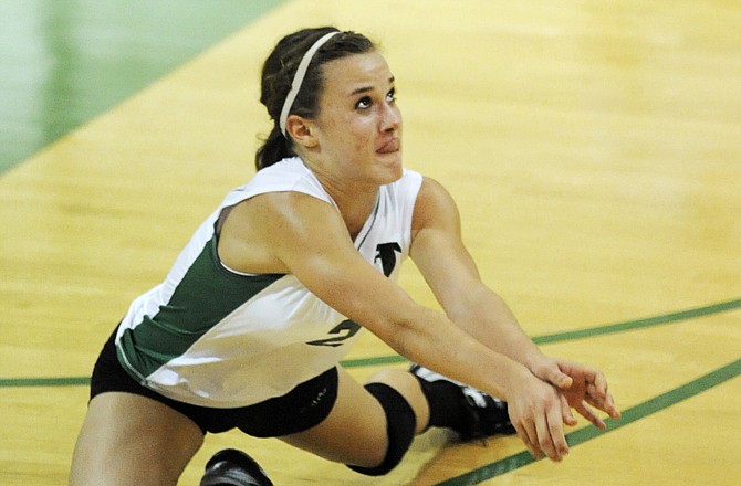 Mckenzie Koelling of Blair Oaks keeps the ball in play during Thursday night's match against School of the Osage in Wardsville.