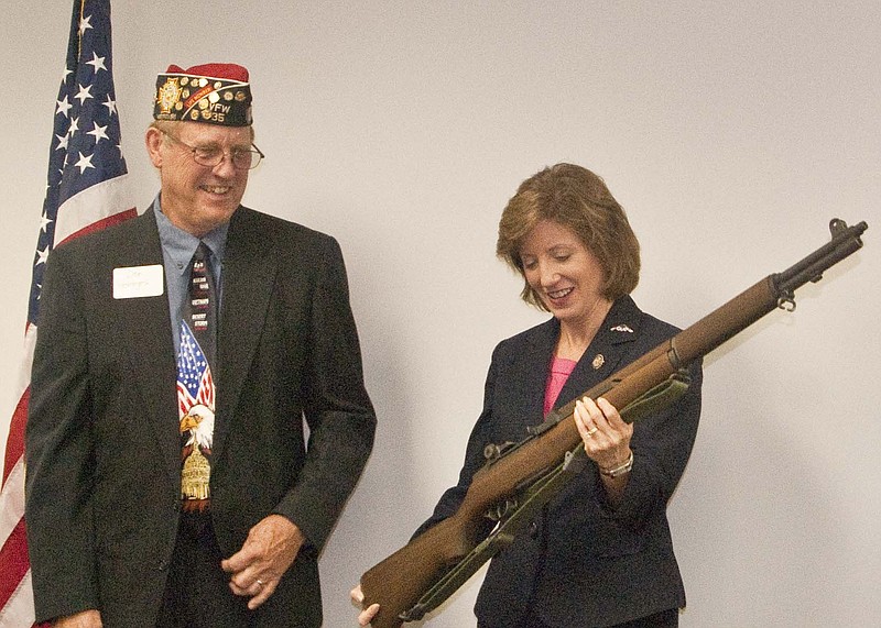 U.S. Rep. Vicky Hartzler presents veteran Don Hentges with an M-1 Garand rifle as part as the Civilian Marksmanship Program's Patriot Award.