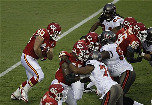Kansas City Chiefs fullback Shane Bannon (40) runs behind blocking during the first half of an NFL football game against the Tampa Bay Buccaneers at Arrowhead Stadium in Kansas City, Mo., Friday, Aug. 12, 2011. The Chiefs have signed Bannon, their seventh-round draft choice, and seven others to their practice squad.