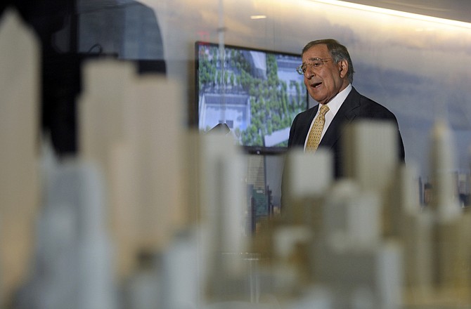 With a model of New York City in the foreground, Defense Secretary Leon Panetta speaks to reporters after touring the National Sept. 11 Memorial and Museum in New York.