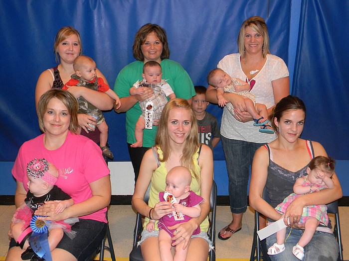 Babies who won the High Point Homecoming Baby Show 0-6 Months; front row, from left, are girls Emma Hoffman (first place) with Elizabeth Hoffman, Emma Jones (second place) with Heather Meloy, and Quinn Elliott (third place) with Tina Calvird; back row, boys Noah Meloy (first place) with Torrey Geiger, Ryan Hart (second place) with Becky Hart, and Dane Fisher (third place) with Yolanda Fisher.