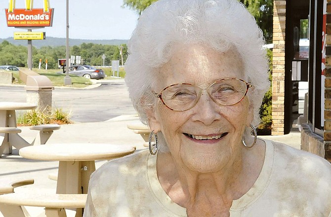 Norma Gaston, 80, has worked as a hostess at McDonald's for 16 years. 