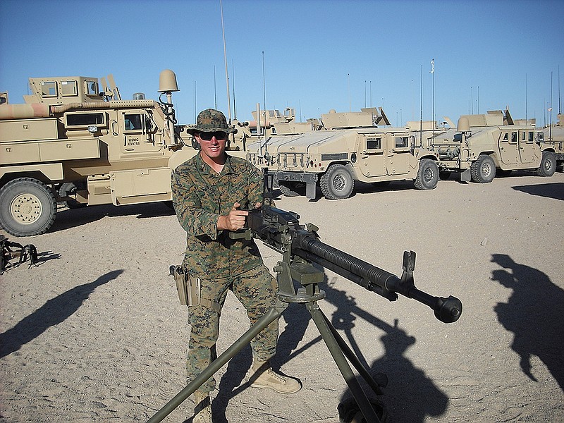 Sgt. Dakota Meyer poses with a machine gun while deployed in support of Operation Enduring Freedom in Ganjgal Village, Kunar province, Afghanistan. The White House announced the 23-year-old Marine scout sniper from Columbia, Ky., who has since left the Marine Corps, will become the first living Marine to be awarded the Medal of Honor in decades.