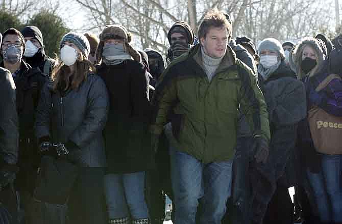 This image released by Warner Bros. Pictures shows Matt Damon in a scene from the film "Contagion." The Hollywood thriller that opened on Sept. 9, 2011, rocketed to No. 1 at the box office through its gripping tale of fictional, global epidemic caused by a new kind of virus. 