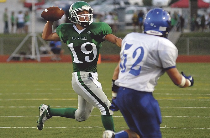 Blair Oaks quarterback Daniel Castillo, shown here throwing for a touchdown in a game earlier this season against Grain Valley, will likely get the start Friday night against Warsaw after improvement from a thigh bruise. 