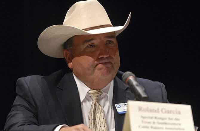 Roland Garcia, Special Ranger for the Texas and Southwestern cattle Raisers Association talks during the Border Security Forum, Monday, Sept. 19, 2011, in Brownsville, Texas. Congressman Ted Poe, of Texas, hosted a Secure Our Texas Border Forum at the University of Texas at Brownsville. Poe and other members of the House Committee on the Judiciary hosted the event that focused on crime and violence on the Texas-Mexico border.