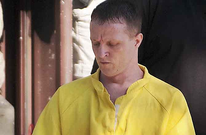 Nicholas Sheley is led out of the Knox County courthouse in Galesburg, Ill., on Monday, Sept. 19, 2011, after being found guilty of seven counts of first-degree murder in the June 2008 death of 65-year-old Ronald Randall. Sheley also was convicted of two counts of aggravated vehicular hijacking and one count of possession of a stolen vehicle. Sheley has pleaded not guilty in five other Illinois killings and in the deaths of an Arkansas couple in Missouri. 