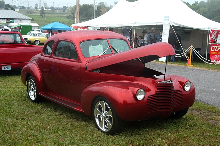 The 1940 Chevrolet Coupe belonging to Mark Ash, California, was awarded the trophy for Best of Show Car at the 2011 Festival Car Show. It also placed first in the category of Street rod Closed to 1948.  