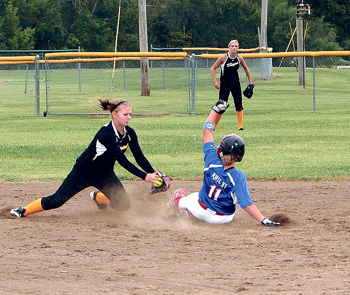 California's Taylor Ratcliff (11) slides safely under the tag as she steals second base during the fourth inning of the varsity softball game against Bunceton Thursday at the California Sports Complex. The Lady Pintos defeated the Lady Dragons 18-10.