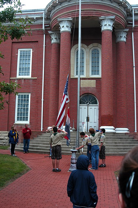 Boy Scout Troop 120 raises and salutes the flag at the 2011 Ozark Ham and Turkey Festival.