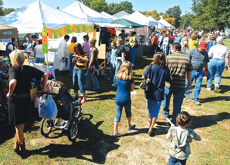 Visitors to a previous Hatton Arts and Crafts Festival look over the vendors' offerings. This year the festival is from 9 a.m. to 4 p.m. Saturday, Oct. 1.
