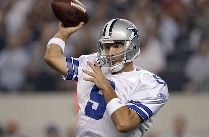 Dallas Cowboys quarterback Tony Romo passes against the Washington Redskins during the first half of an NFL football game Monday, Sept. 26, 2011, in Arlington, Texas.