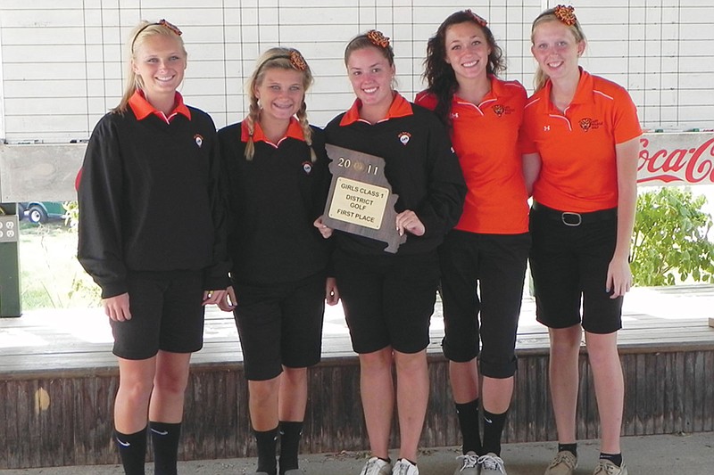 From left to right: Senior Ashtin Withers, sophomore Alex Withers, senior Shannon Crumpton, senior McKinzie Welschmeyer and freshman Ashley Kelley pose hold New Bloomfield's Class 1 District 3 championship plaque at Tanglewood Golf Course on Wednesday afternoon. The district title is the first in the four-year history of New Bloomfield girls golf. 