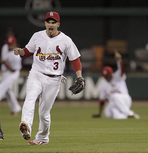 Cardinals shortstop Ryan Theriot celebrates Tuesday following Game 4 of the National League Division Series at Busch Stadium. The Cardinals beat the Phillies 5-3.