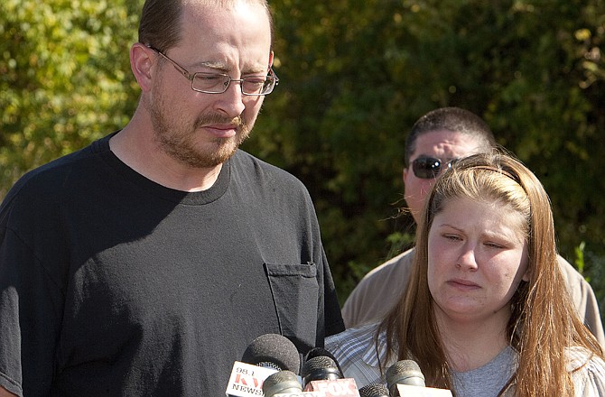 The parents of missing 10-month-old Lisa Irwin, Jeremy Irwin and Deborah Bradley, speak during a news conference Wednesday in Kansas City.