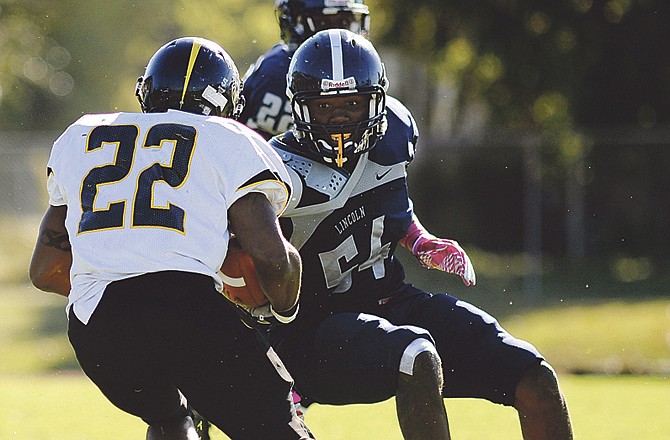 Lincoln linebacker Kendrick Causey (54) and the Blue Tigers will take on Missouri Western today in St. Joseph. 