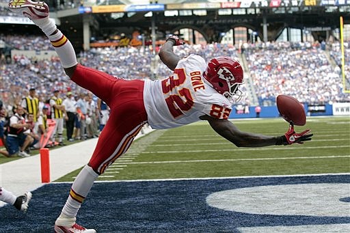 Kansas City Chiefs wide receiver Dwayne Bowe makes a one-handed catch for a touchdown against the Indianapolis Colts in the third quarter of an NFL football game in Indianapolis, Sunday, Oct. 9, 2011.