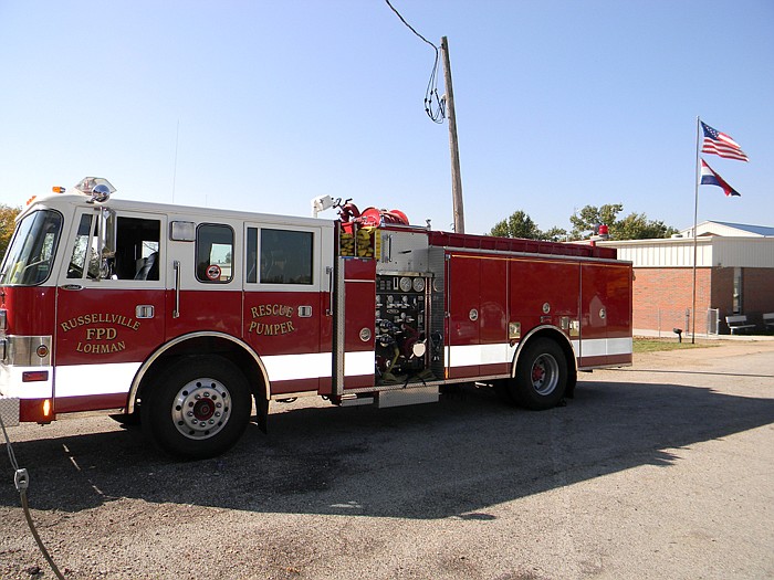 A fire truck from the Russellville/Lohman Fire Protection District was parked at the Russellville Elementary school to draw attention for the spaghetti dinner held in the cafeteria Sunday, Oct. 9. Funds raised will go towards new uniforms for the Russellville/Lohman Fire Protection District.