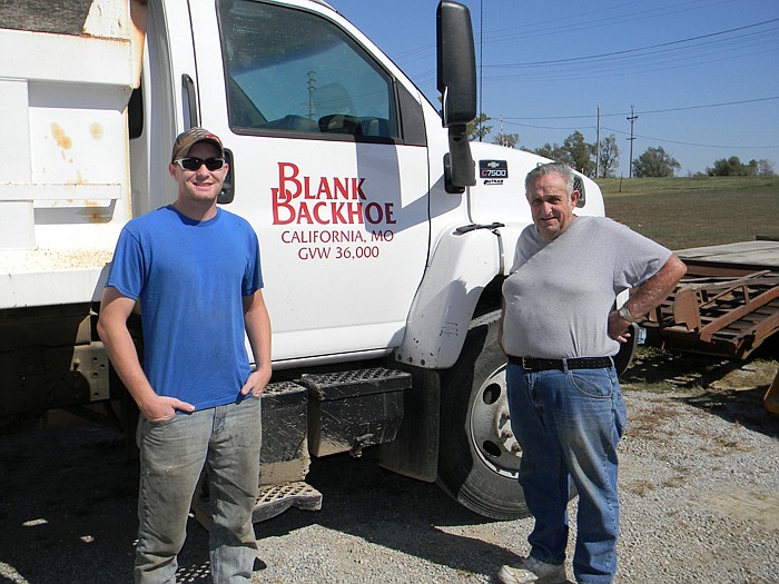 Blank Backhoe Service Owner Larry Blank with son Tyler Blank, left.