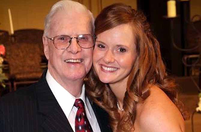 In this undated family photo provided by Debbie Frederick, William Thomas Beach, of Mustang, Okla., left, is shown with granddaughter Katerine Crouse. Beach died Sept. 1, and few days later, Oklahoma and federal health officials linked his illness to the nationwide Listeria outbreak. 