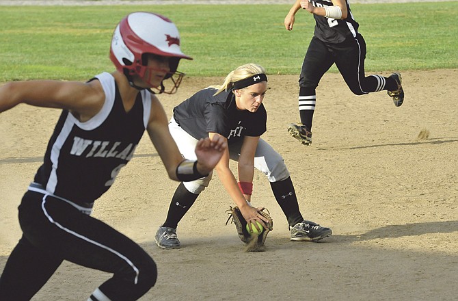 Lady Jays third baseman Madison Painter fields a grounder as a pair of Willard runners run in the area during Wednesday afternoon's Class 4 sectional game at Lincoln Field.