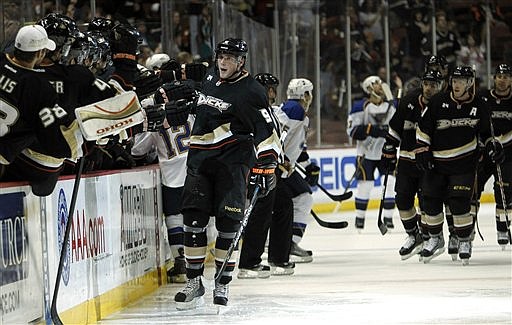Anaheim Ducks left wing Bobby Ryan (9) celebrates with his bench after scoring against the St. Louis Blues during the first period of an NHL hockey game, Sunday, Oct. 16, 2011, in Anaheim, Calif.