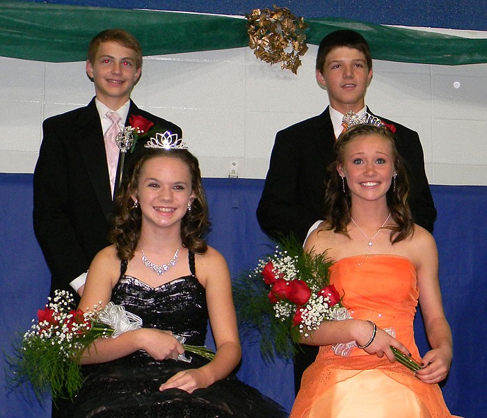 The 2011 Russellville Carnival Royal Court sitting together after being crowned at the 2011 Russellville Carnival Coronation Ceremony Friday, Oct. 15; front row, from left, are 2011 Princess Libby Mueller and 2011 Queen Erica Miller; back row, 2011 Prince Anthony Bertucci and 2011 King Ryland Johnson.