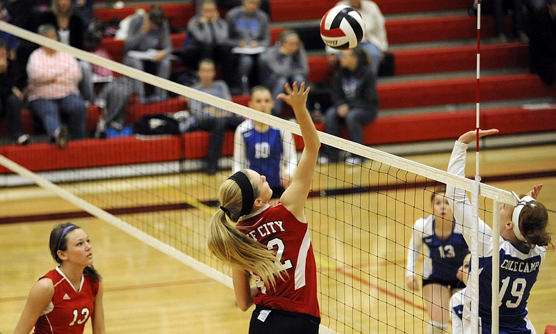 Jefferson City's Sloan Pleus goes up for a kill on match point during the Lady Jays' win over Cole Camp on Tuesday at Fleming Fieldhouse.