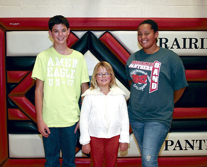 Selected as the Prairie Home School Students of the Month for September, from left, are freshman Tyler Young, second grader Paiton Williams, and seventh grader Jameshia Johnson.